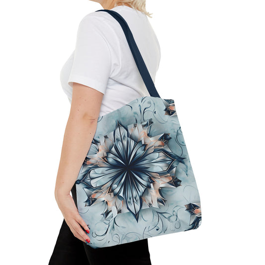 Indigo Mirage canvas tote bag worn over shoulder displaying flowing indigo artwork