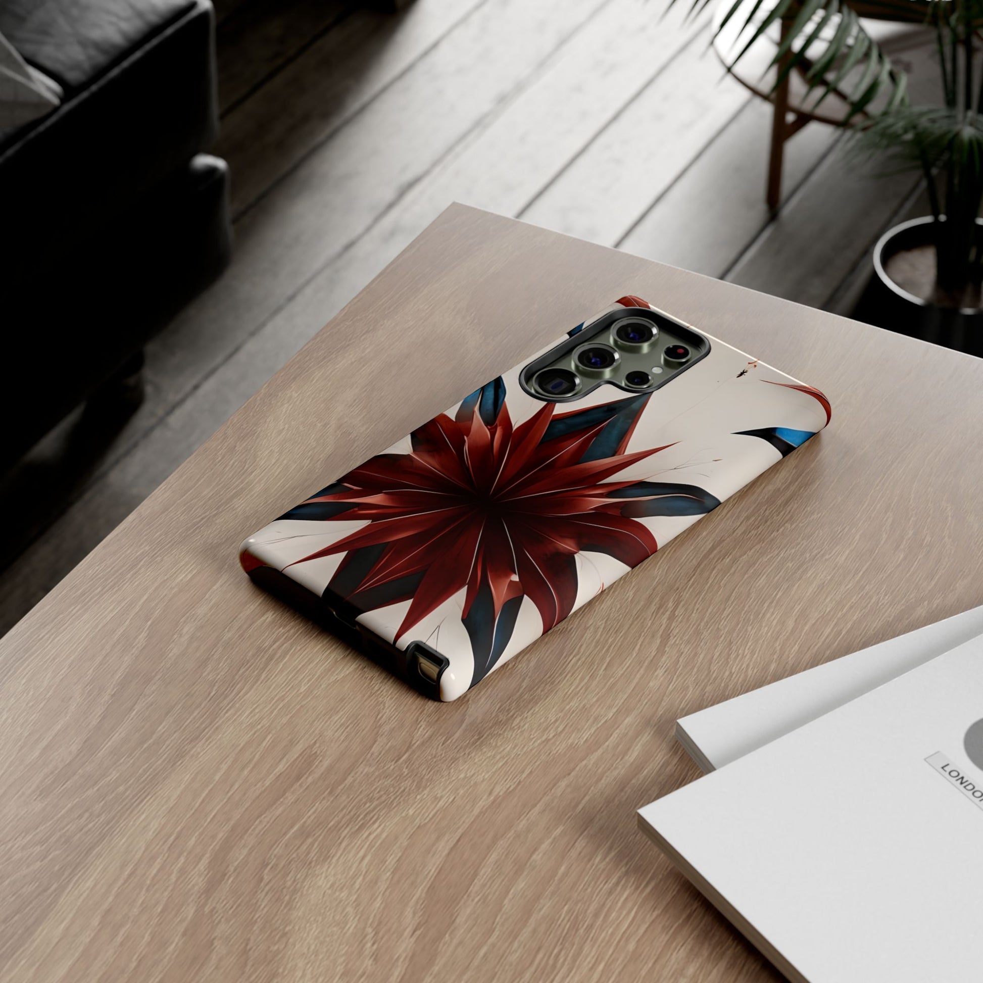 Garnet Starburst red, white and blue starburst Samsung Galaxy phone case lifestyle desk scene