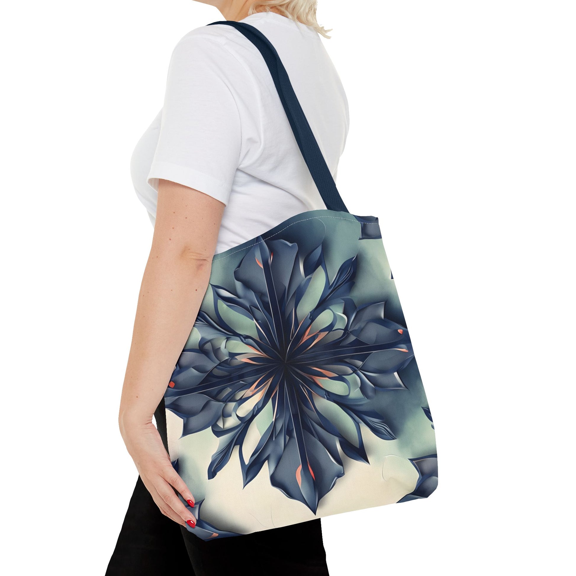 Frosted Indigo Bloom canvas tote bag worn over shoulder showing detailed indigo flower artwork