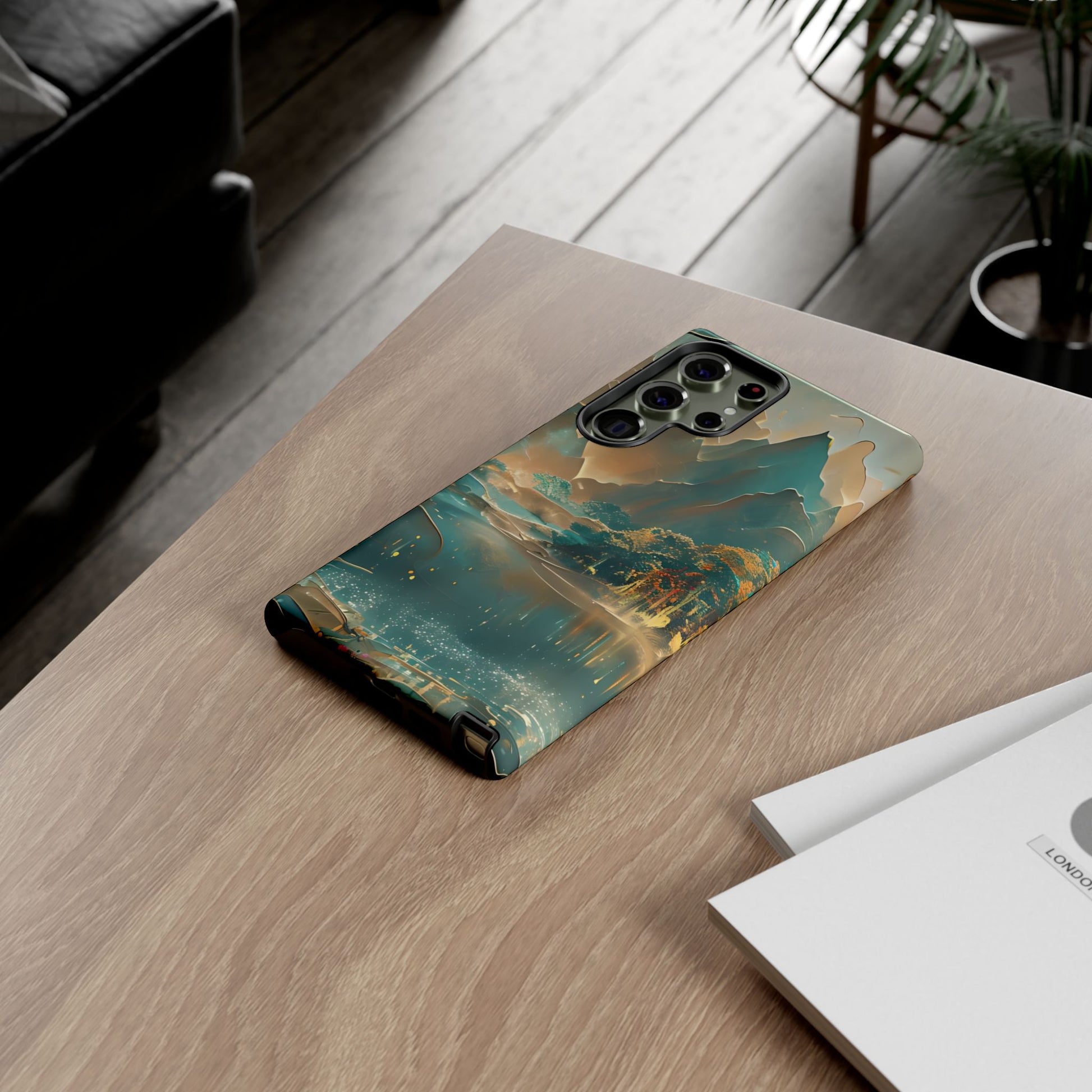 Misty Horizon Samsung Galaxy mountain landscape phone case on wooden desk beside laptop and notebook, cozy lifestyle flat lay