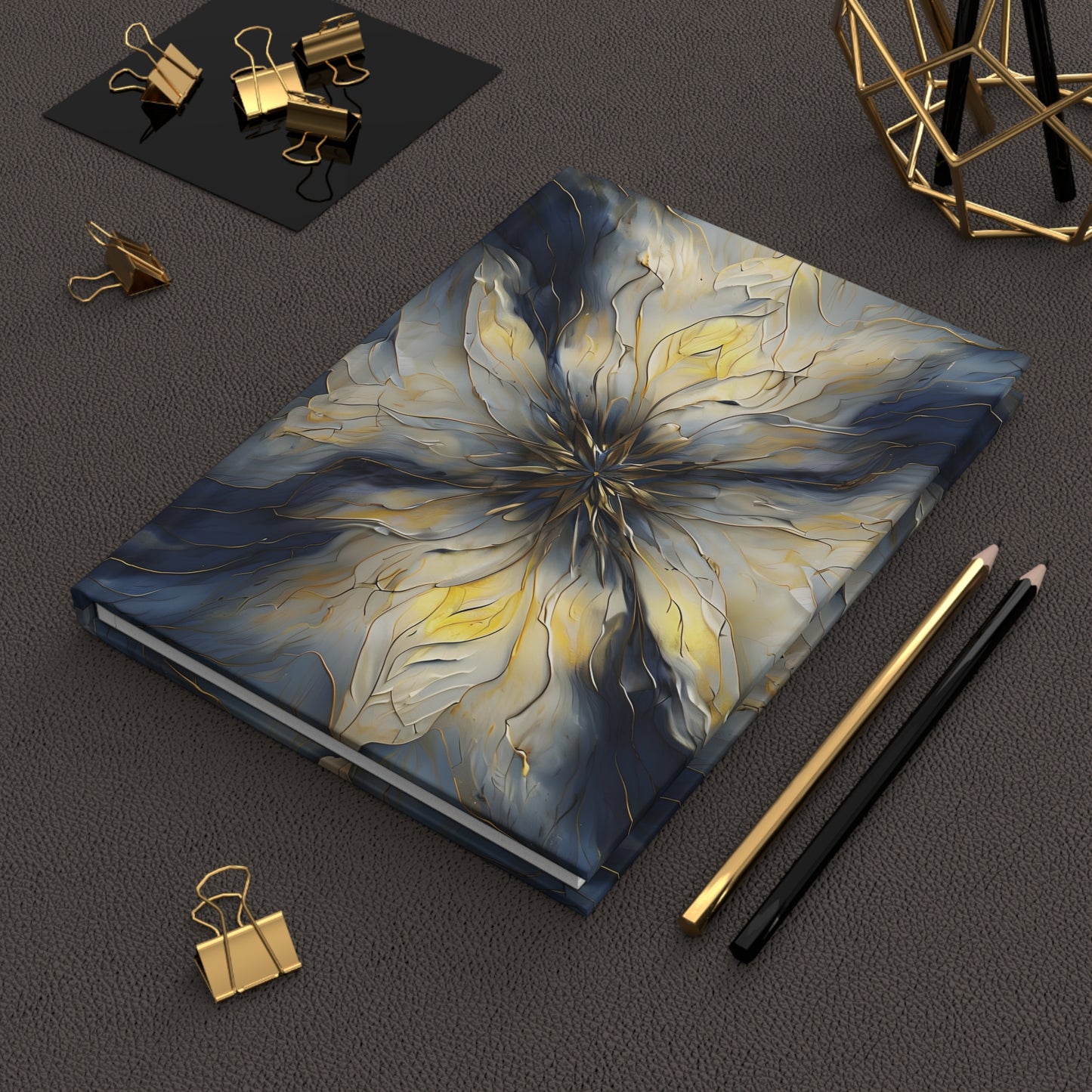 Luminous Petal hardcover journal on desk with pencils and stationery