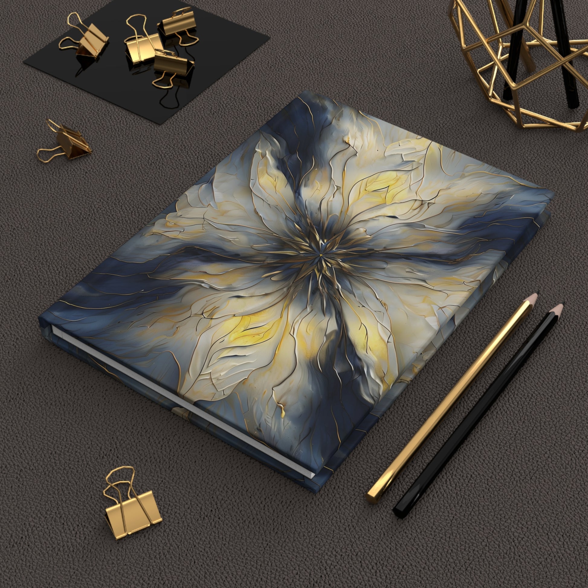 Luminous Petal hardcover journal on desk with pencils and stationery