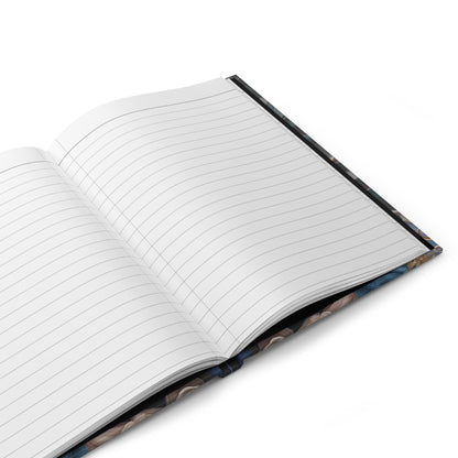Open hardcover journal showing lined writing pages inside Peony Midnight Tapestry notebook