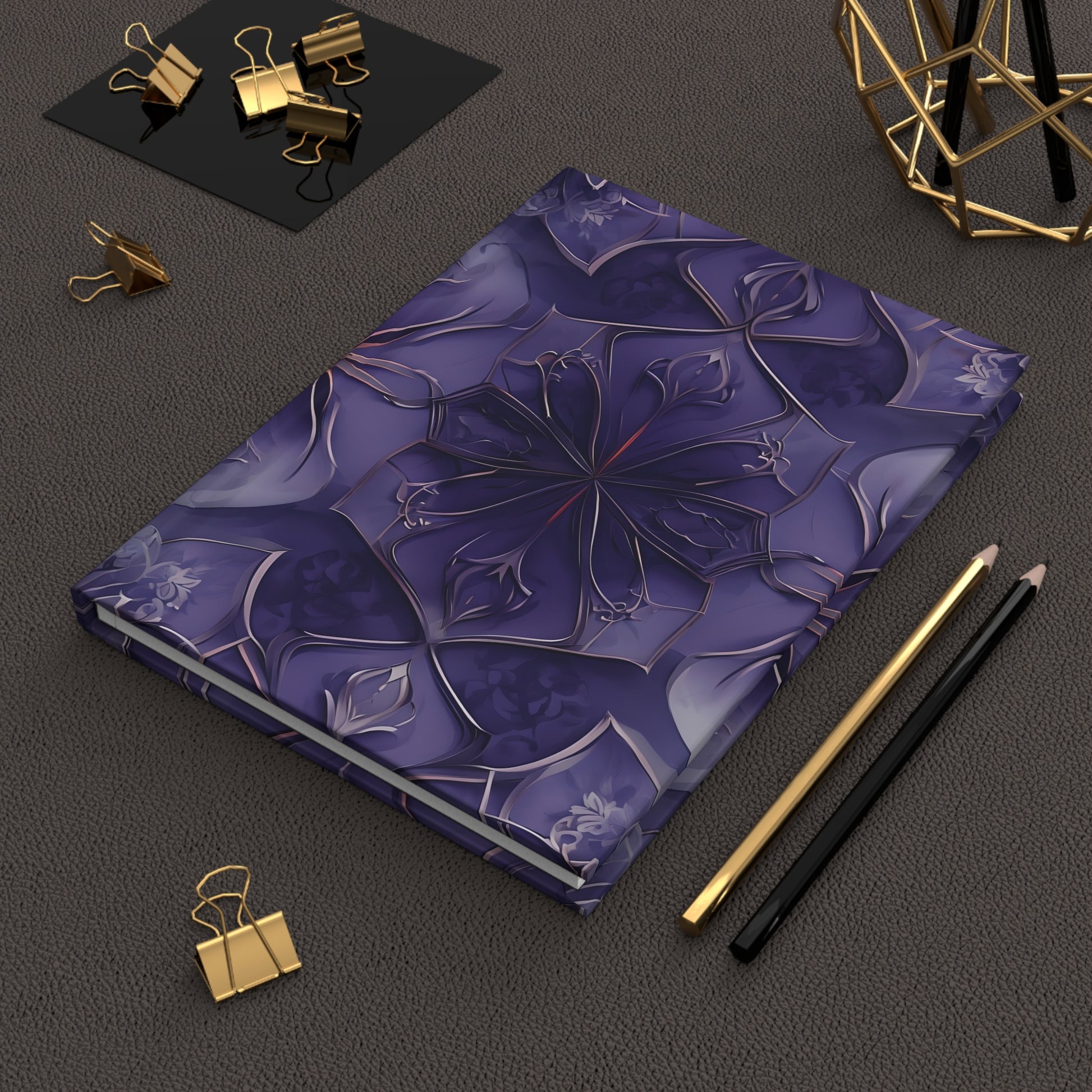 Violet Nebula hardcover journal on desk with pencils and stationery