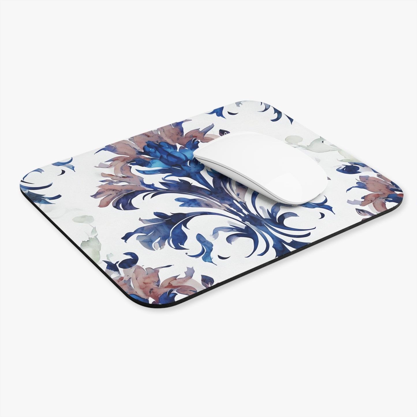 Delft Reverie mouse pad in workspace with mouse showing blue floral design