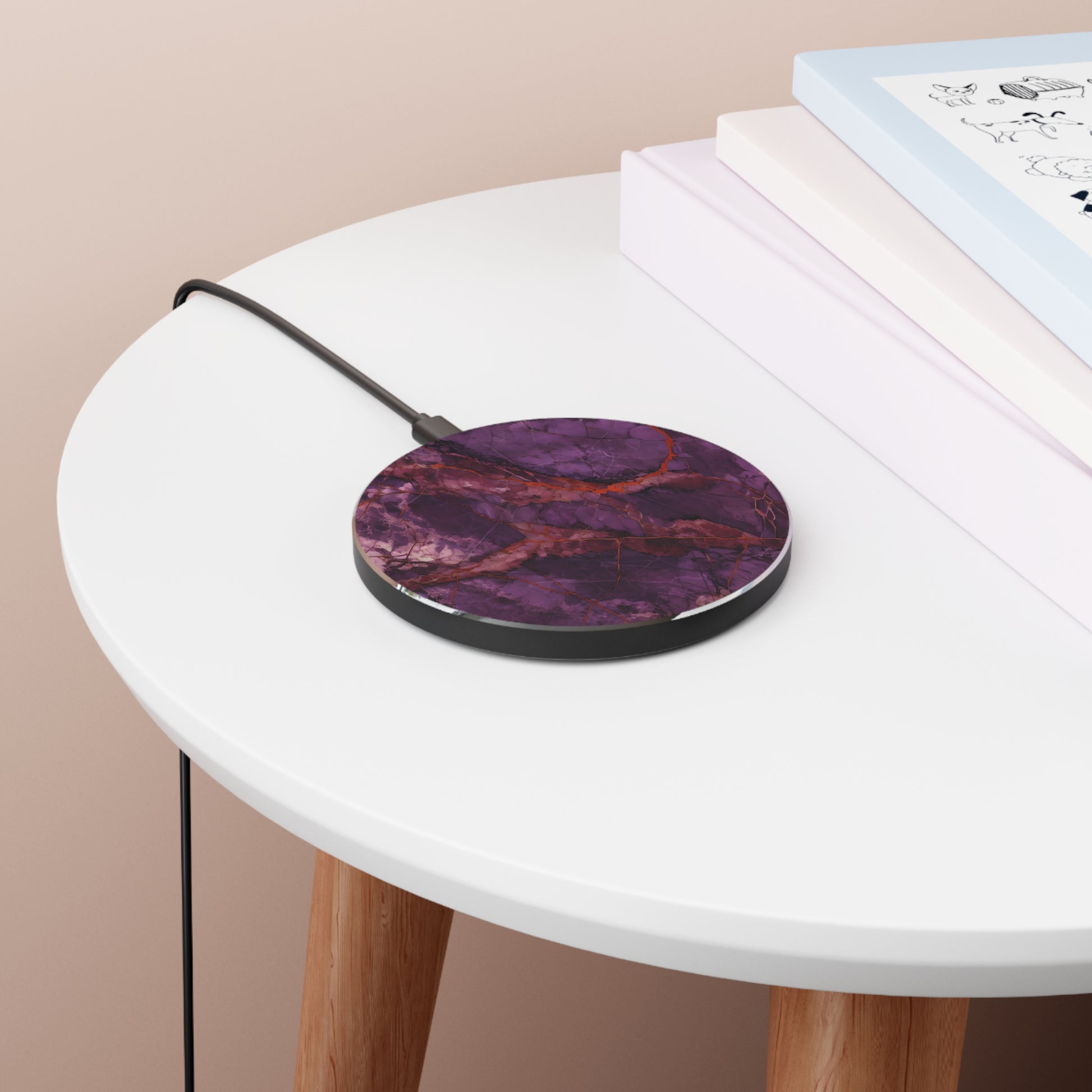 Amethyst Current purple marble stone art Qi wireless charger on bedside table with books