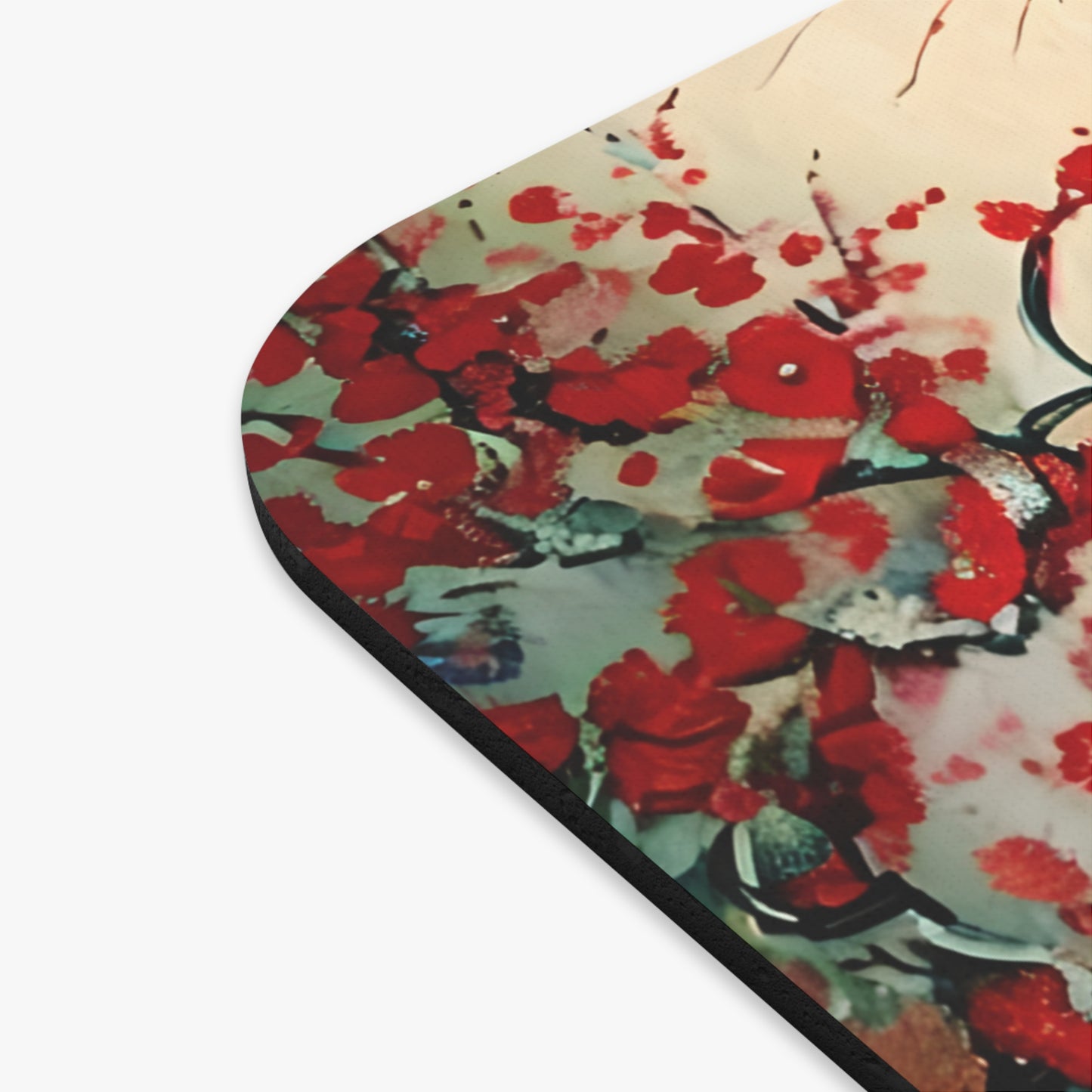 Close-up of Crimson Blossom mouse pad showing printed blossom detail
