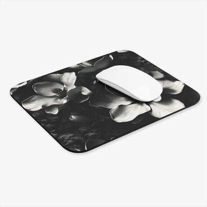 Monochrome Magnolia mouse pad in workspace with mouse showing magnolia flower design