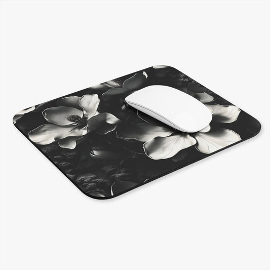 Monochrome Magnolia mouse pad in workspace with mouse showing magnolia flower design