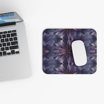 Twilight Tapestry mouse pad beside laptop displaying twilight floral design
