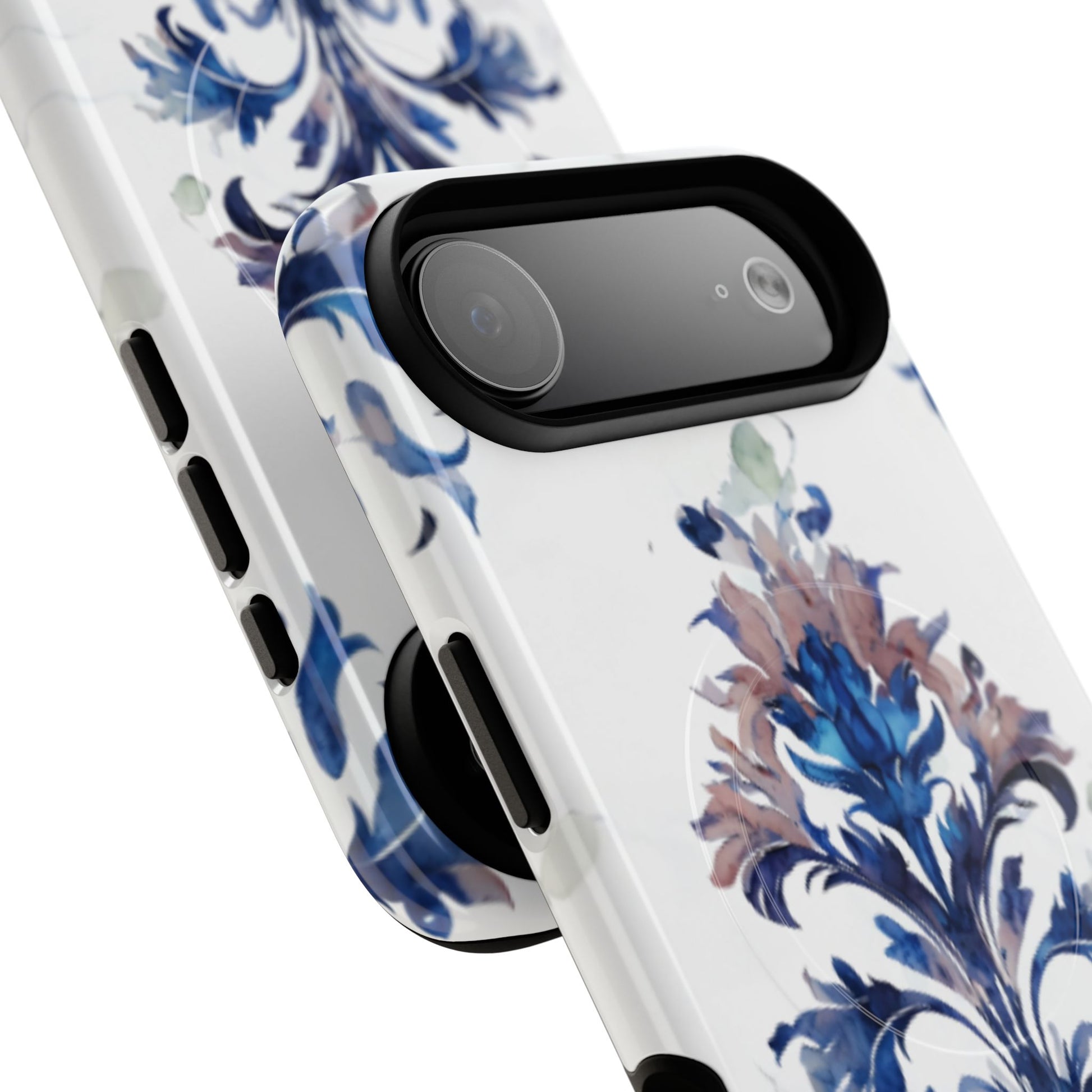 Angled view of Delft Reverie blue and white ceramic floral iPhone MagSafe case with large camera cutout
