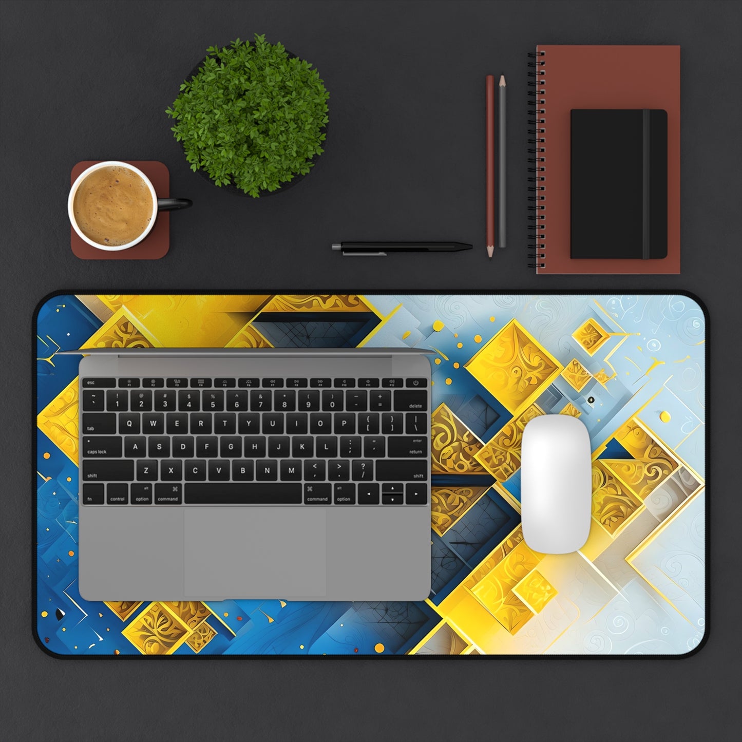 Golden Ascent desk mat in workspace with keyboard showing vibrant geometric design