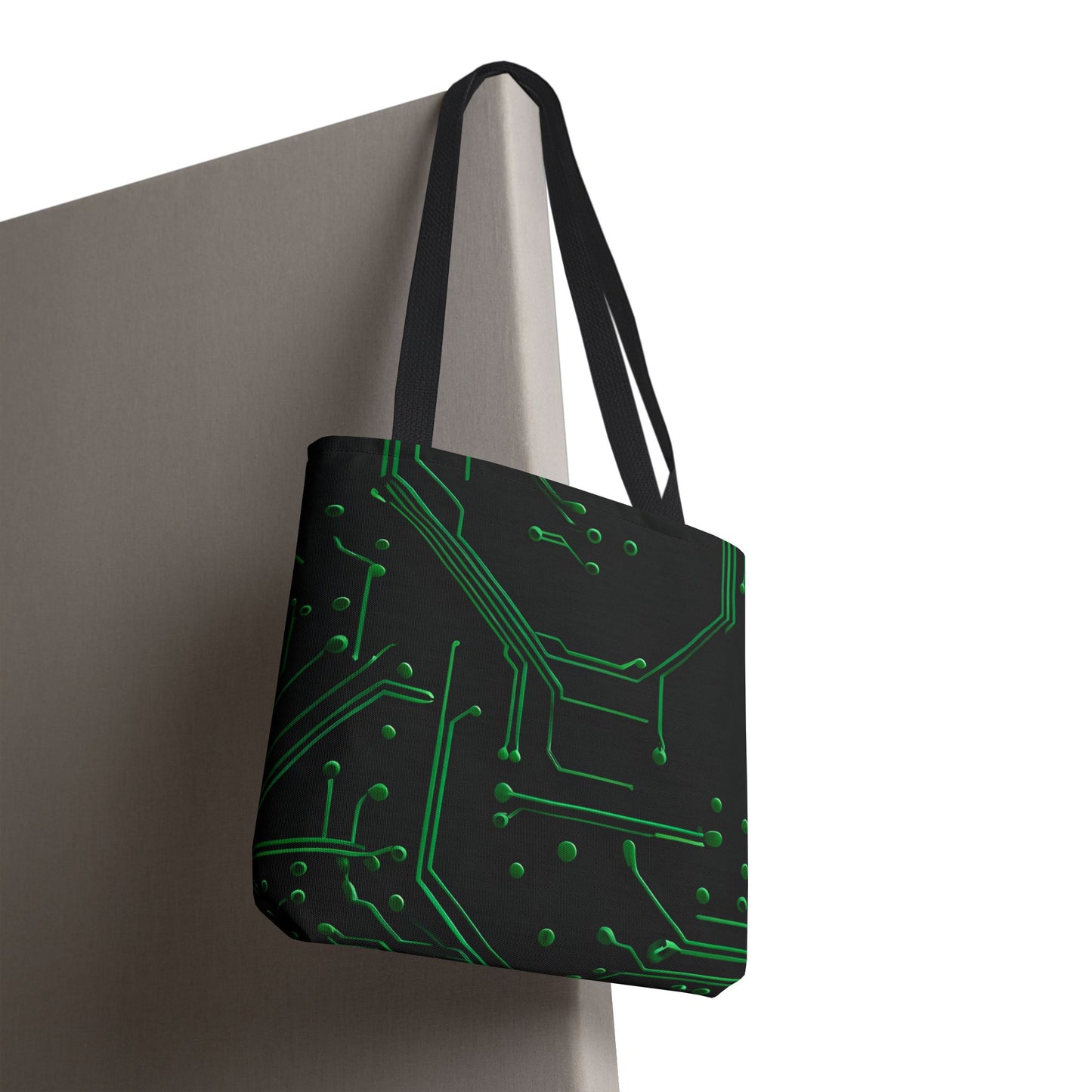 Green Circuit Grid canvas tote bag hanging with digital circuit grid pattern