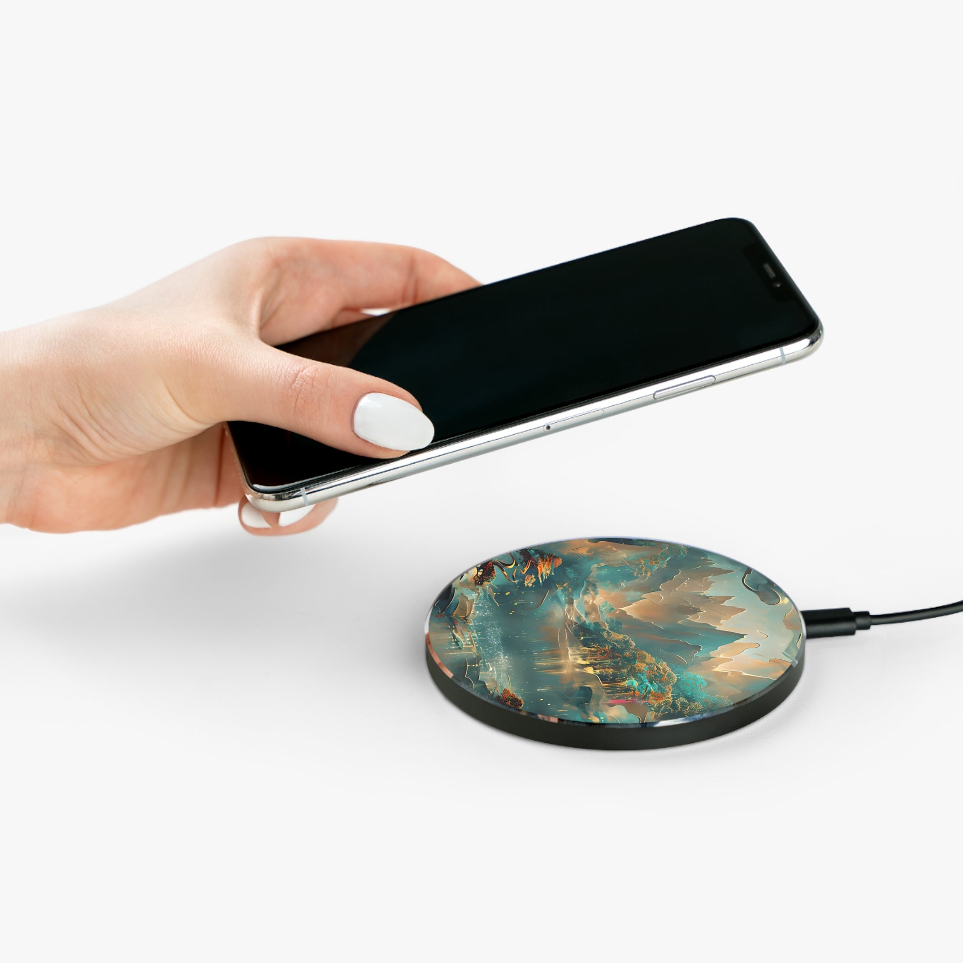 Hand placing smartphone on Misty Horizon fantasy mountain lake design Qi wireless charger