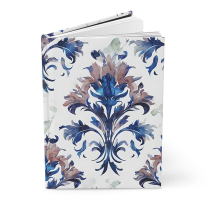 Delft Reverie hardcover journal showing detailed blue botanical artwork on the cover