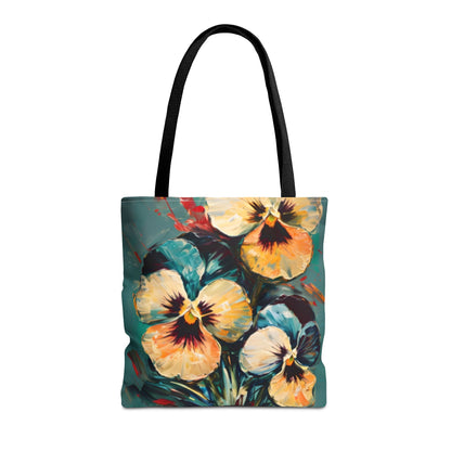 Golden Pansy Cascade floral tote bag featuring cascading yellow and orange pansies on deep teal background with black handles