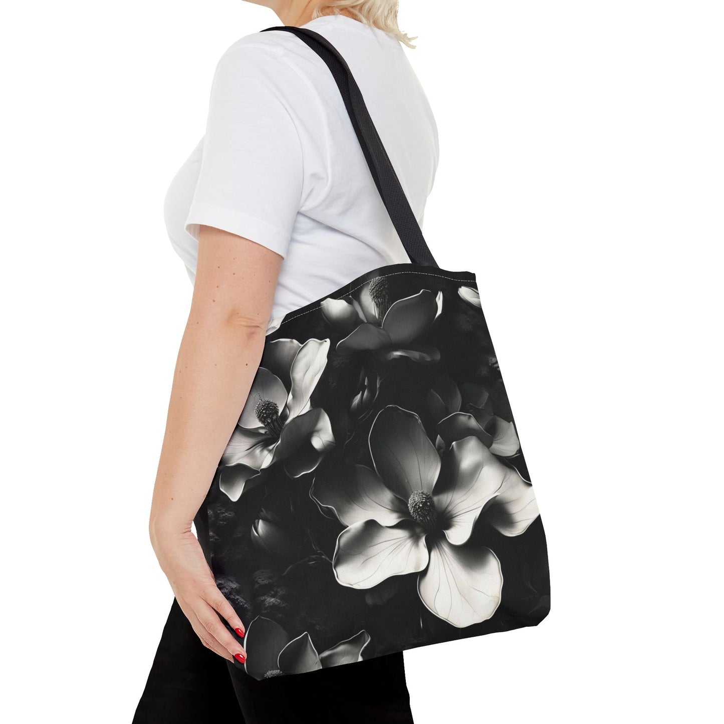 Monochrome Magnolia canvas tote bag worn over shoulder showing elegant magnolia floral illustration