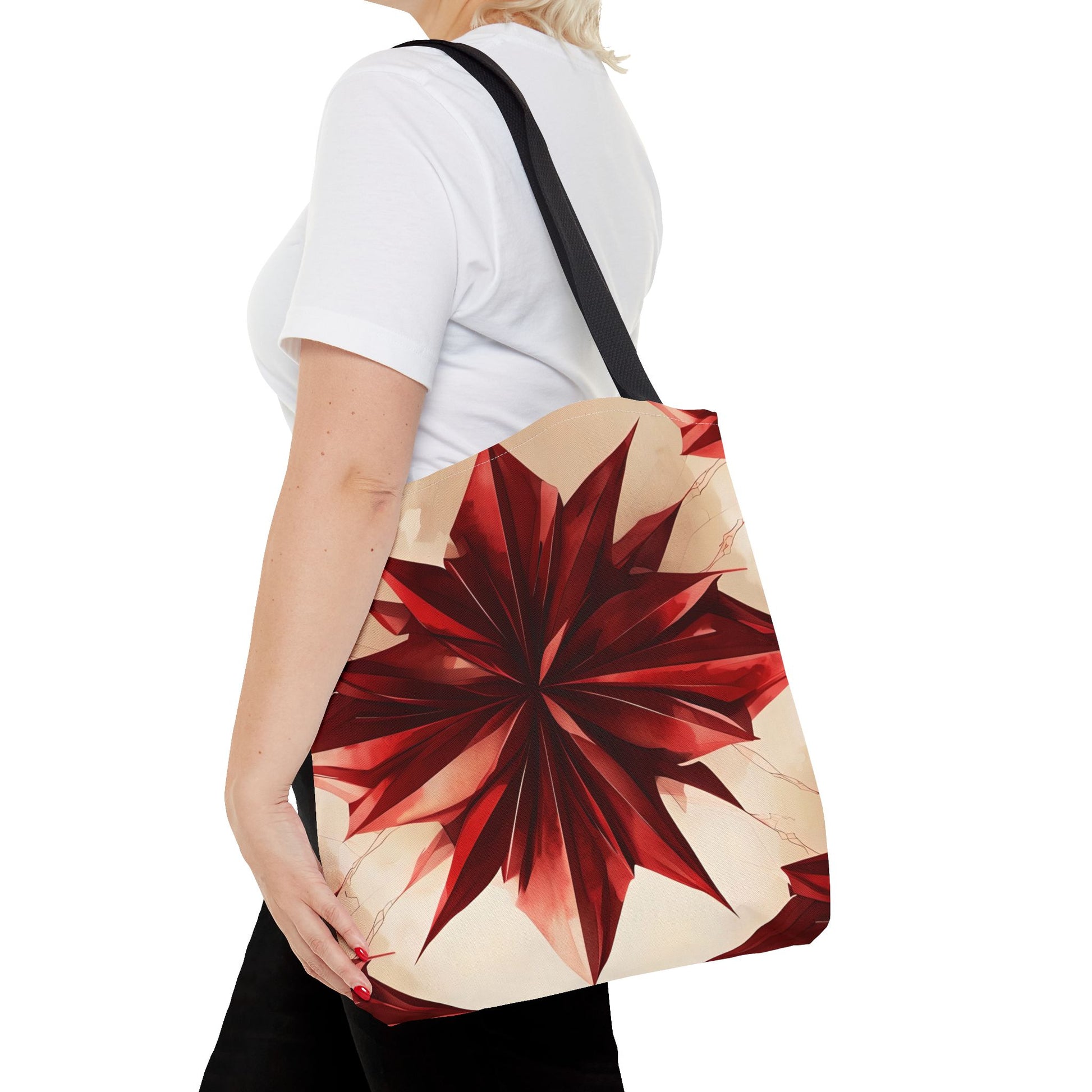 Ruby Compass canvas tote bag worn over shoulder showing vibrant red compass pattern