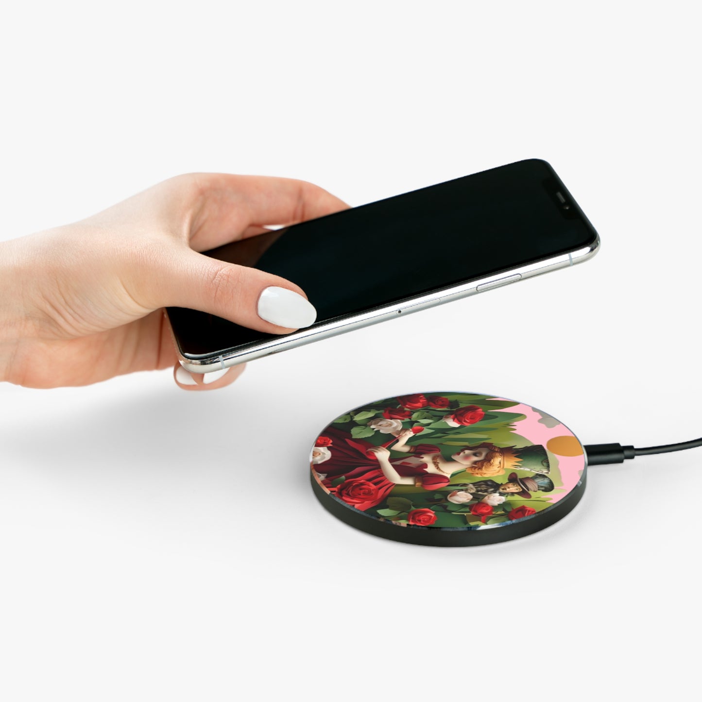 Hand placing smartphone on Royal Rose Court vintage rose garden design Qi wireless charger