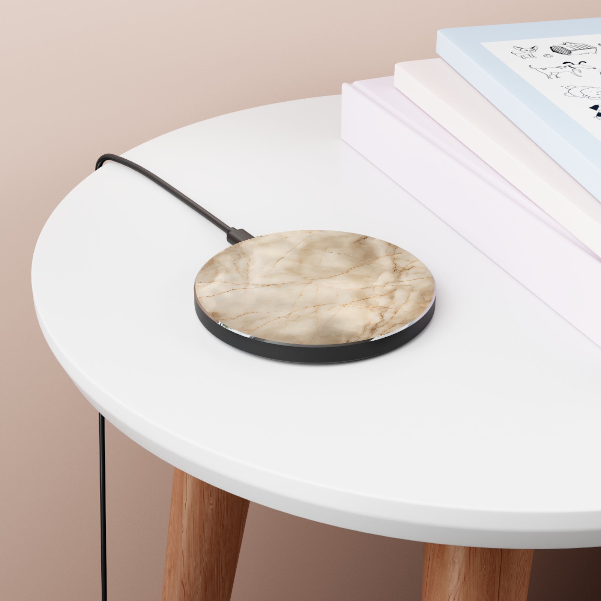 Parchment Mist beige marble art Qi wireless charger on bedside table with books