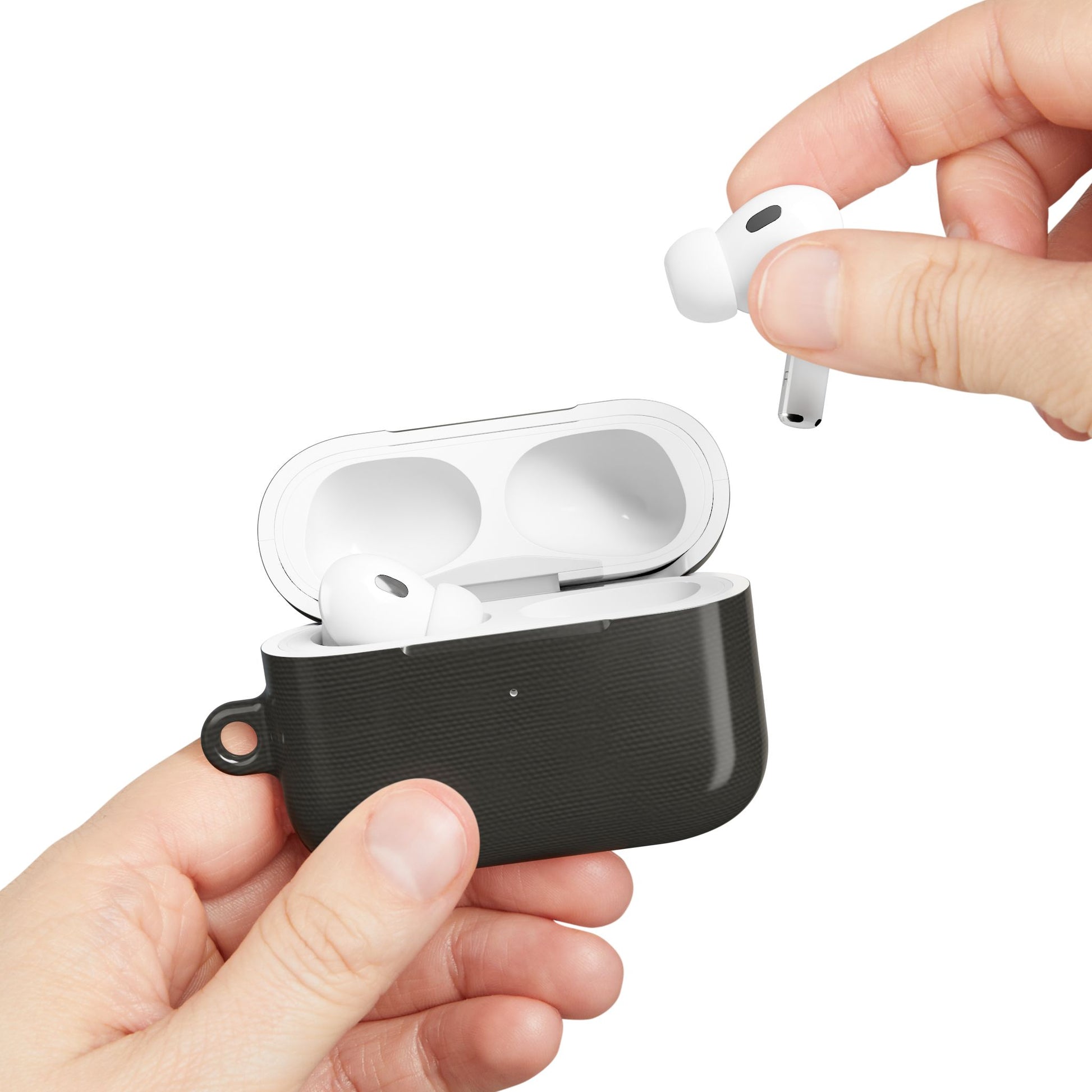 Hand placing AirPods into Charcoal Linen AirPods case with dark linen texture design