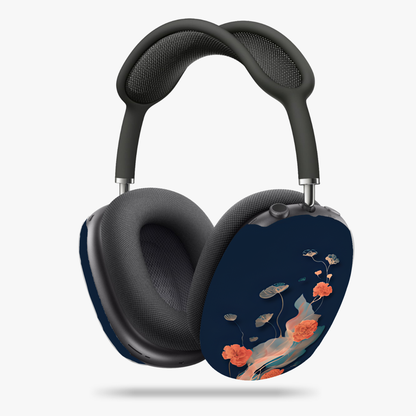 Lotus Reverie AirPods Max cover with coral lotus flowers and flowing petals on deep navy background, angled view on Apple AirPods Max headphones