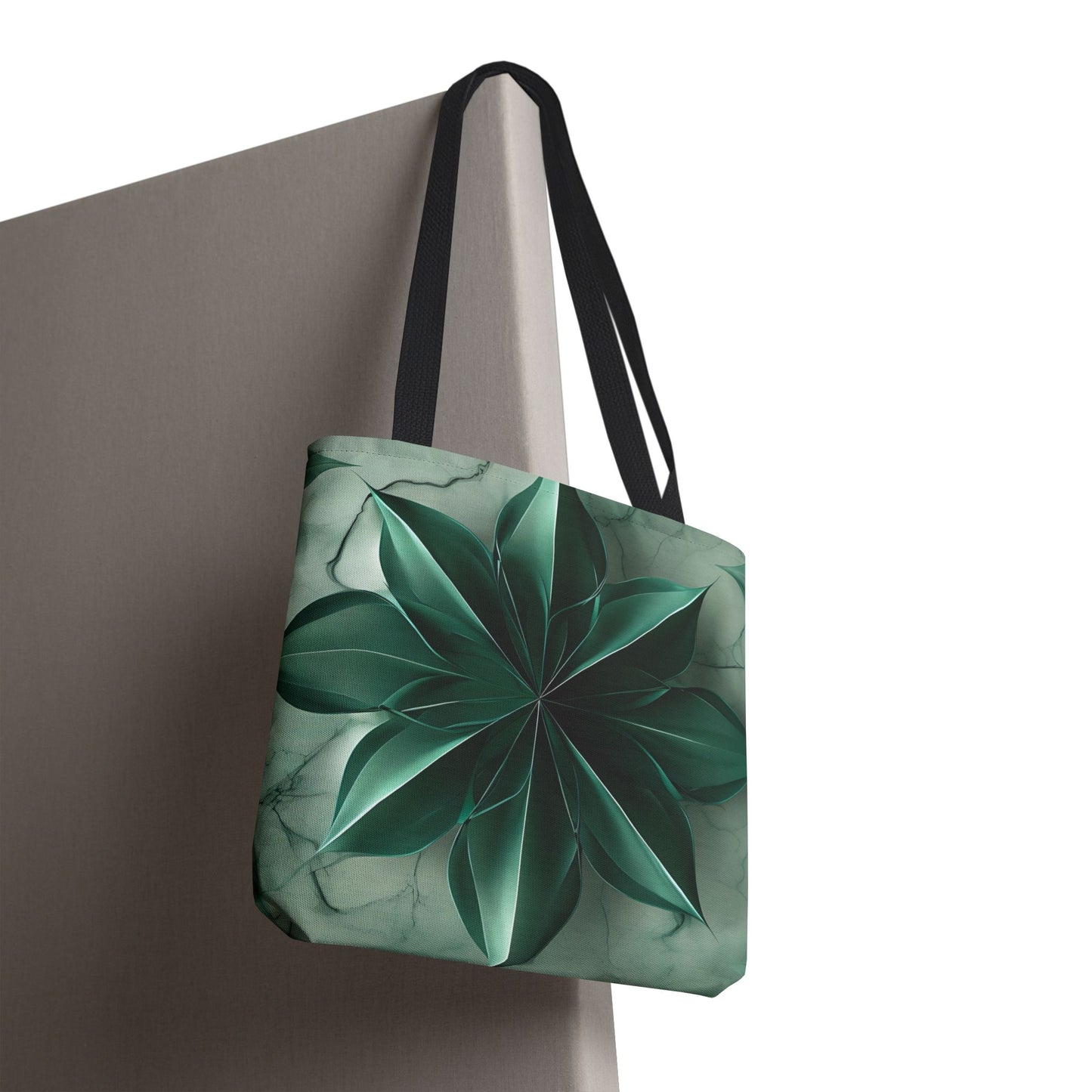 Emerald Bloom canvas tote bag hanging with emerald, green floral bloom design
