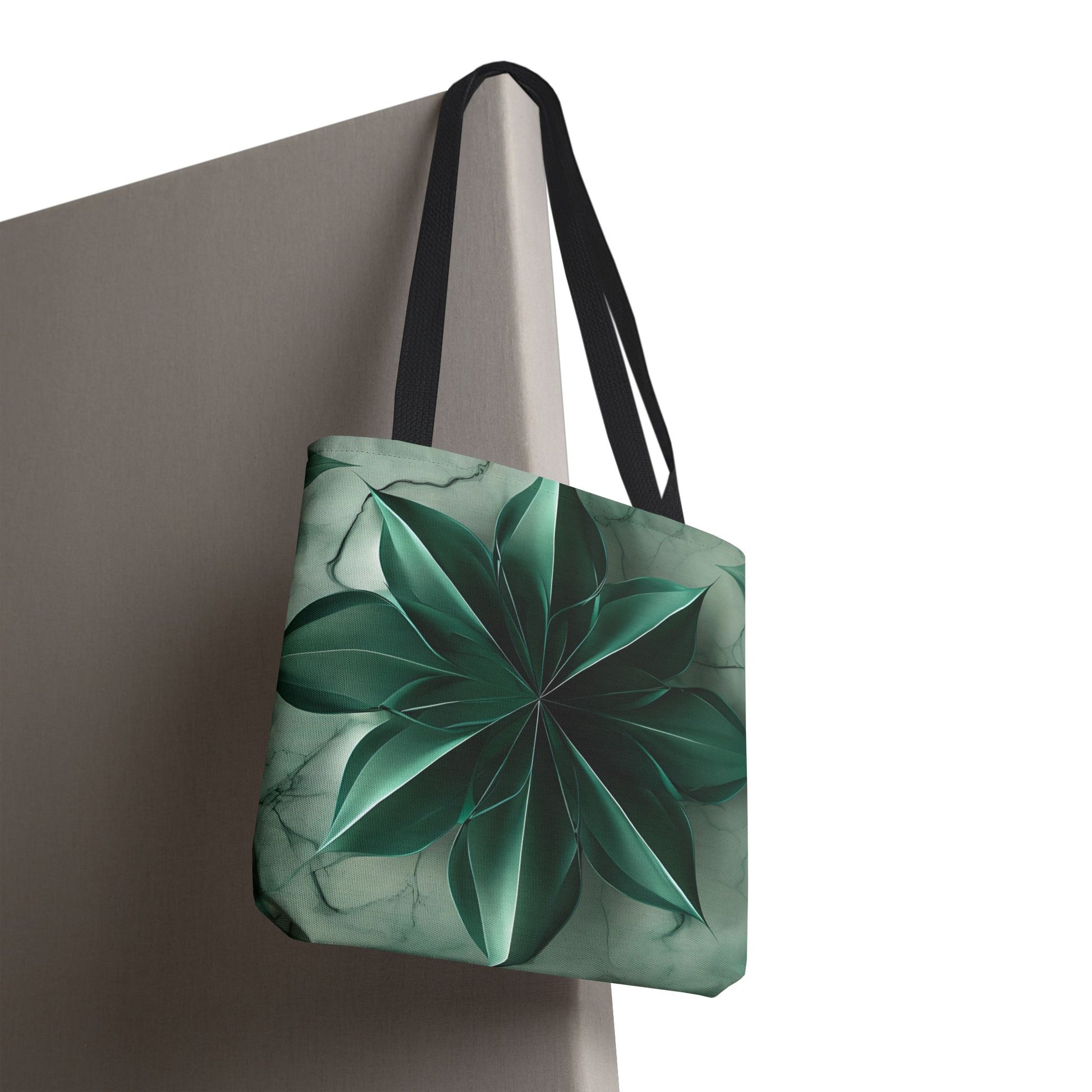 Emerald Bloom canvas tote bag hanging with emerald, green floral bloom design