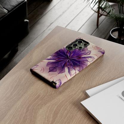 Violet Reverie purple floral Samsung Galaxy phone case on wooden desk beside laptop and notebook, lifestyle flat lay
