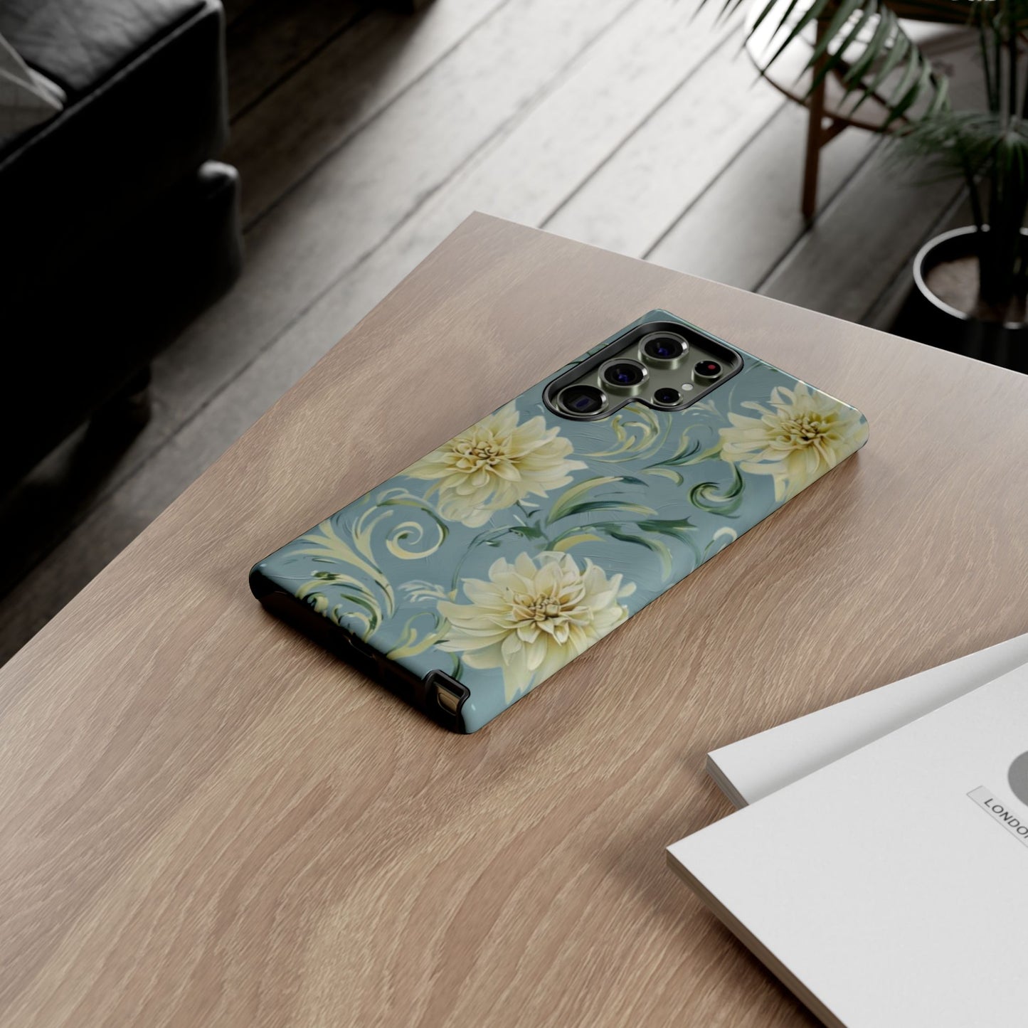 Golden Dahlia Trio Samsung Galaxy floral phone case on wooden desk beside laptop and notebook, romantic lifestyle