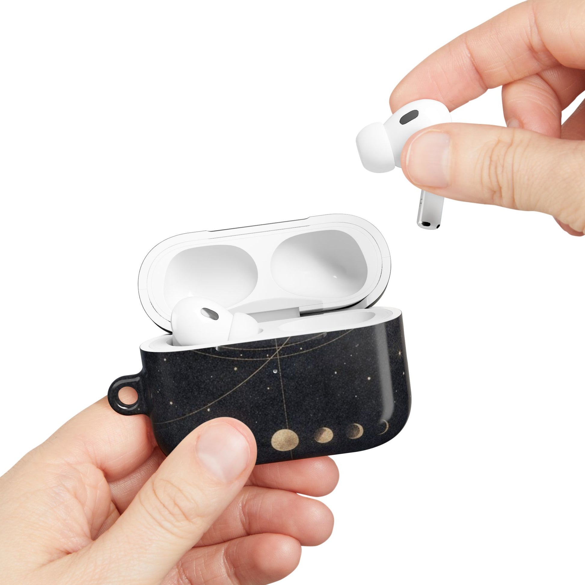 Hand placing AirPods into Celestial Moon Phase AirPods case with celestial moon phase design