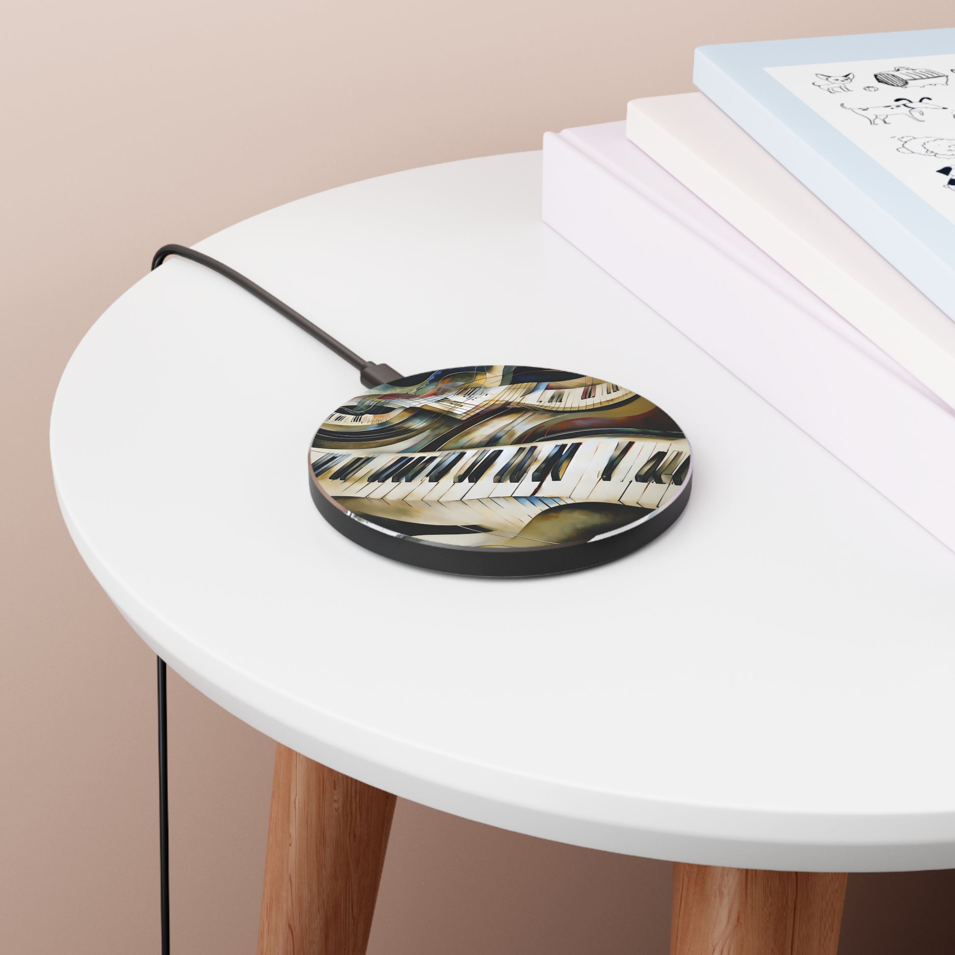 Ivory Cascade piano keyboard music art Qi wireless charger on bedside table with books