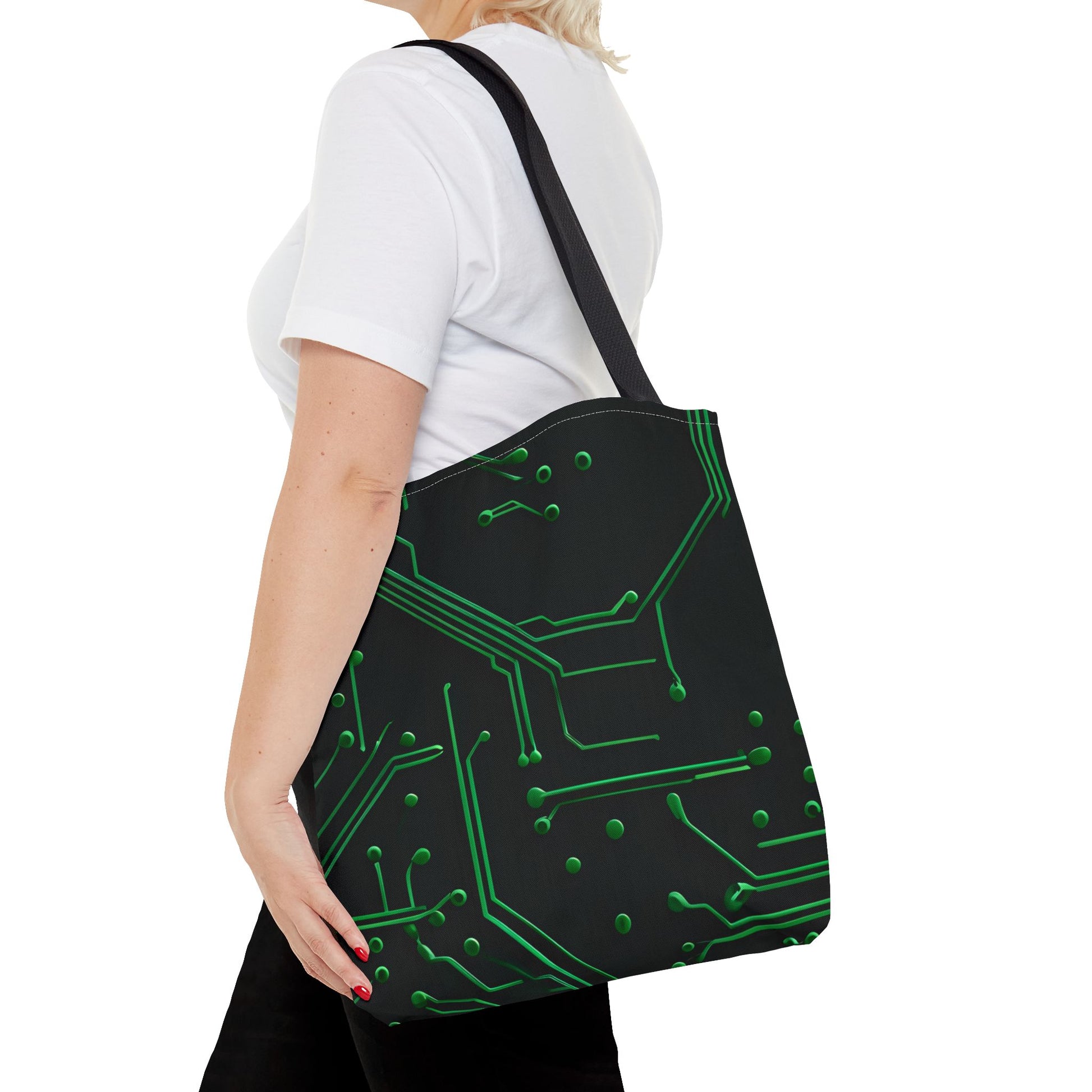 Green Circuit Grid canvas tote bag worn over shoulder showing glowing green tech circuit design