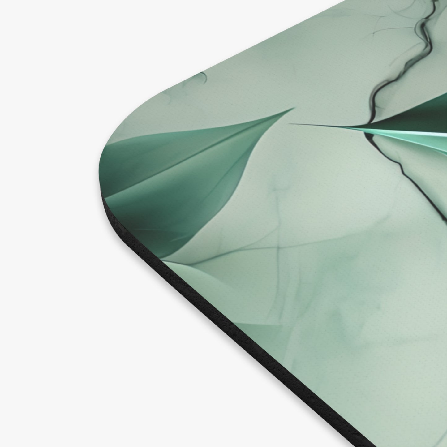 Close-up of Emerald Bloom mouse pad showing printed floral bloom detail