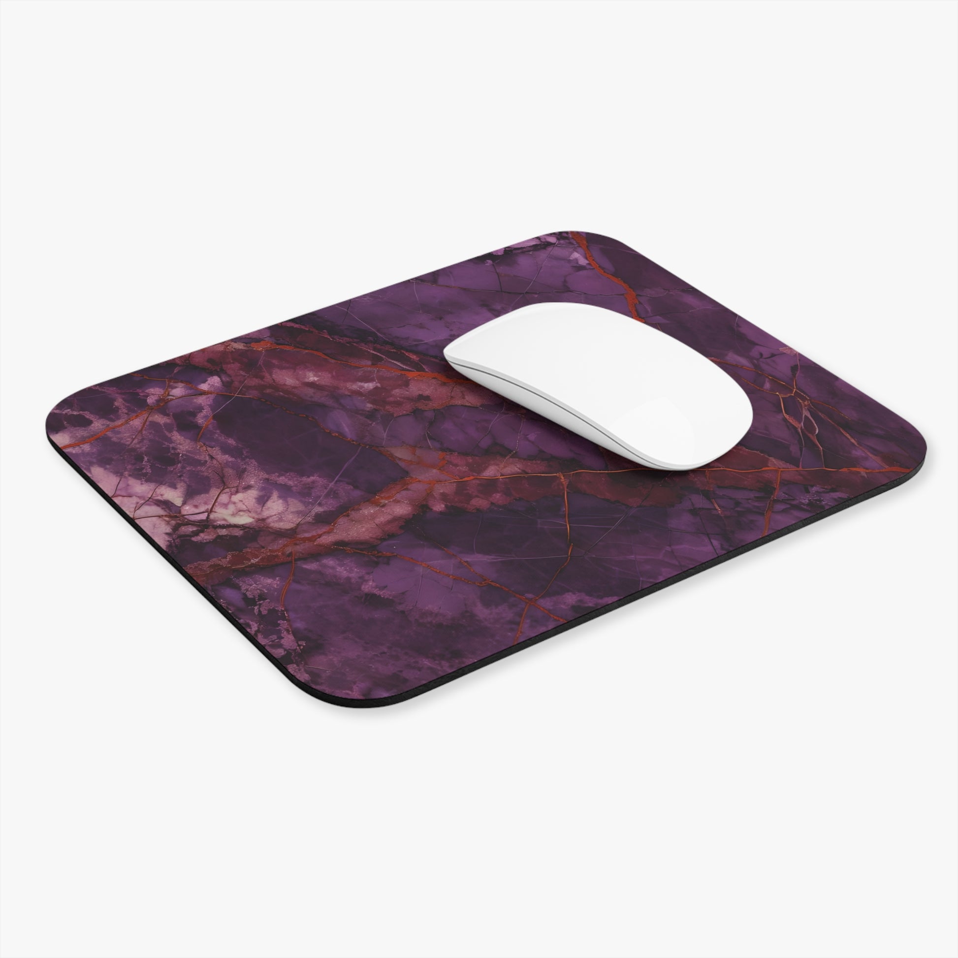 Amethyst Current mouse pad in workspace with mouse showing vibrant purple artwork
