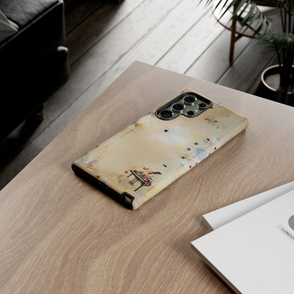 Keys of Imagination Samsung Galaxy piano phone case on wooden desk beside laptop and notebook, creative lifestyle flat lay