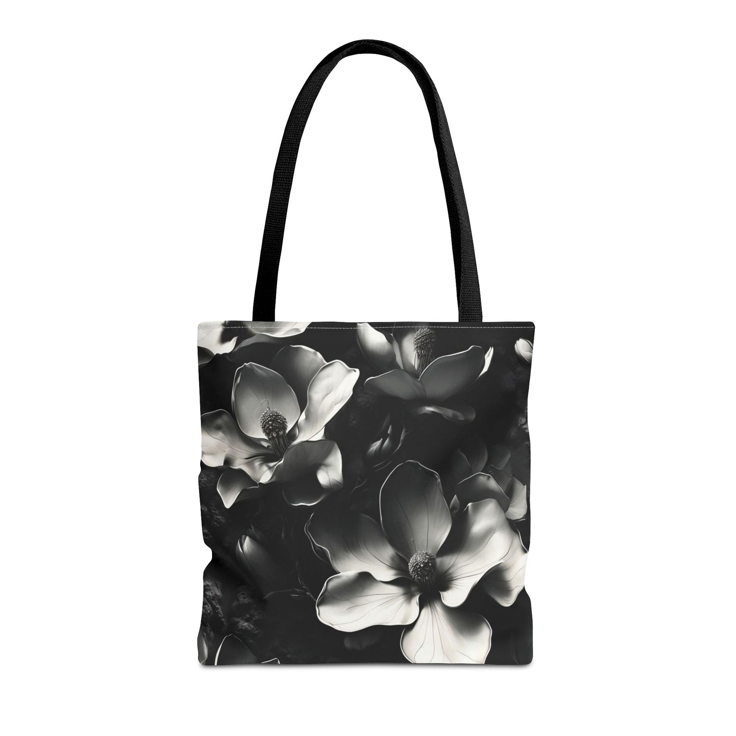 Monochrome Magnolia canvas tote bag featuring black and white magnolia flower artwork with black handles