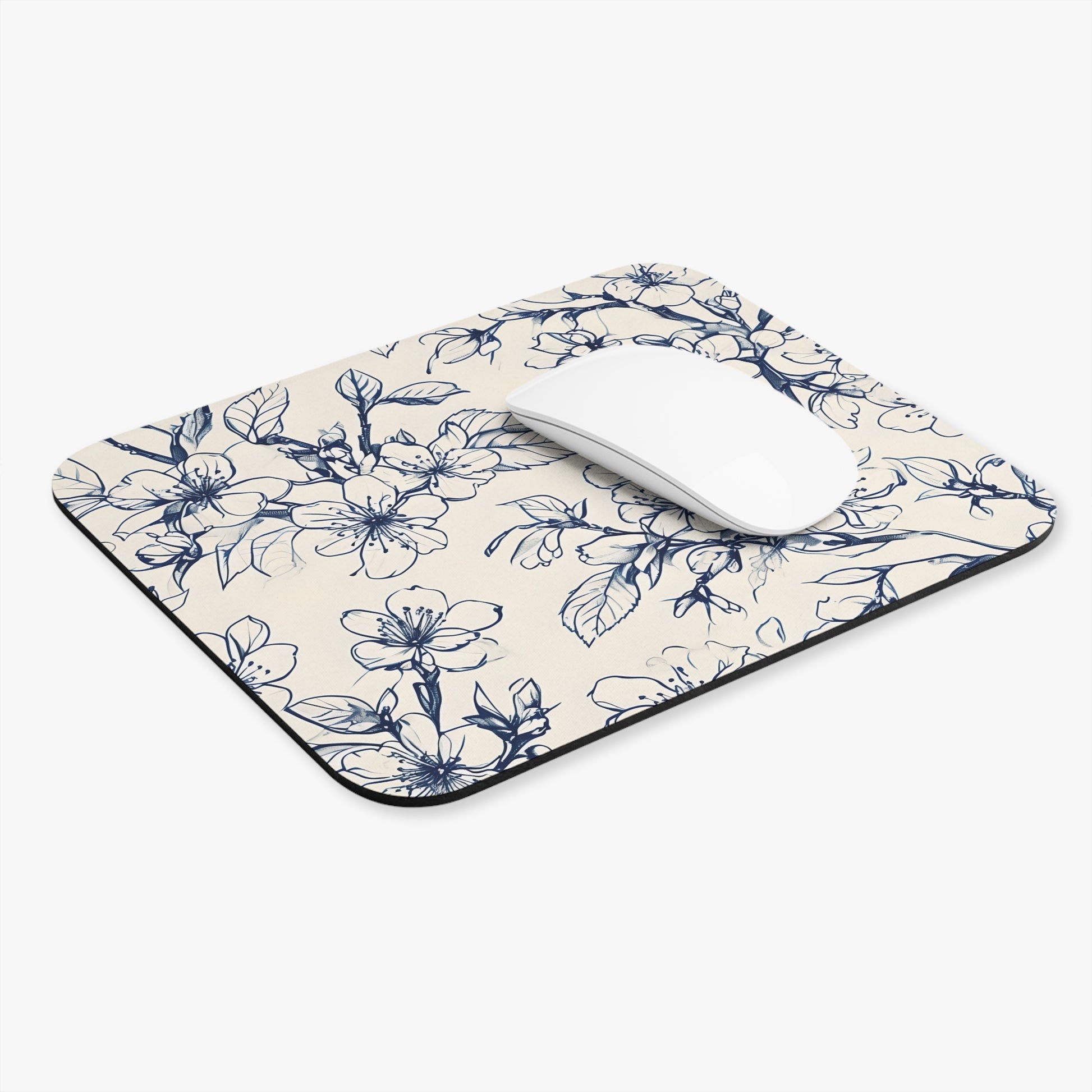 Blossom Sketch mouse pad in workspace with mouse showing botanical sketch design