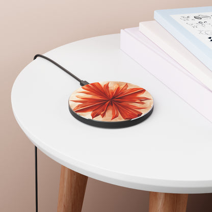 Sunset Fleur orange floral mandala art Qi wireless charger on bedside table with books