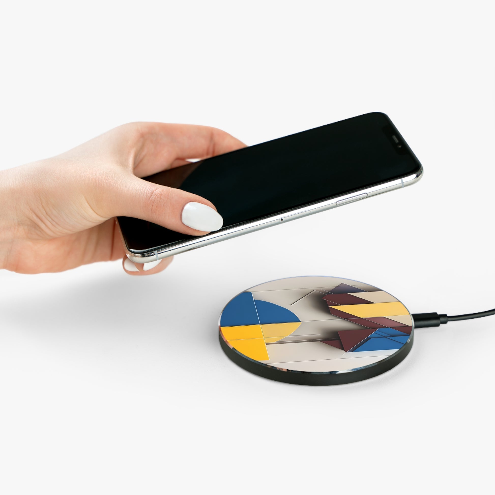 Hand placing smartphone on Chromatic Construct geometric color block design Qi wireless charger