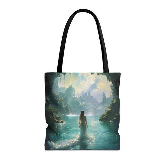 Celestial Tides canvas tote bag featuring an elegant woman looking over a flowing teal and ocean-inspired design with black handles
