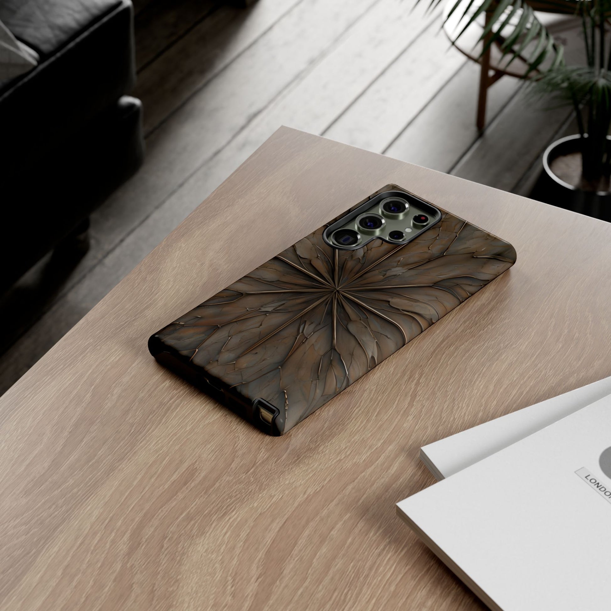 Earthstone Mandala Samsung Galaxy mandala phone case on wooden desk beside laptop and notebook, boho lifestyle flat lay