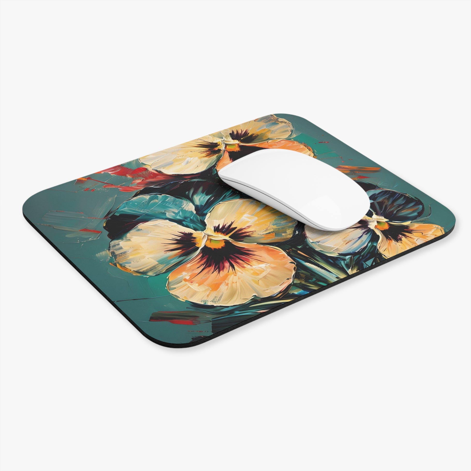 Golden Pansy Cascade mouse pad in workspace with mouse showing vibrant pansy floral design