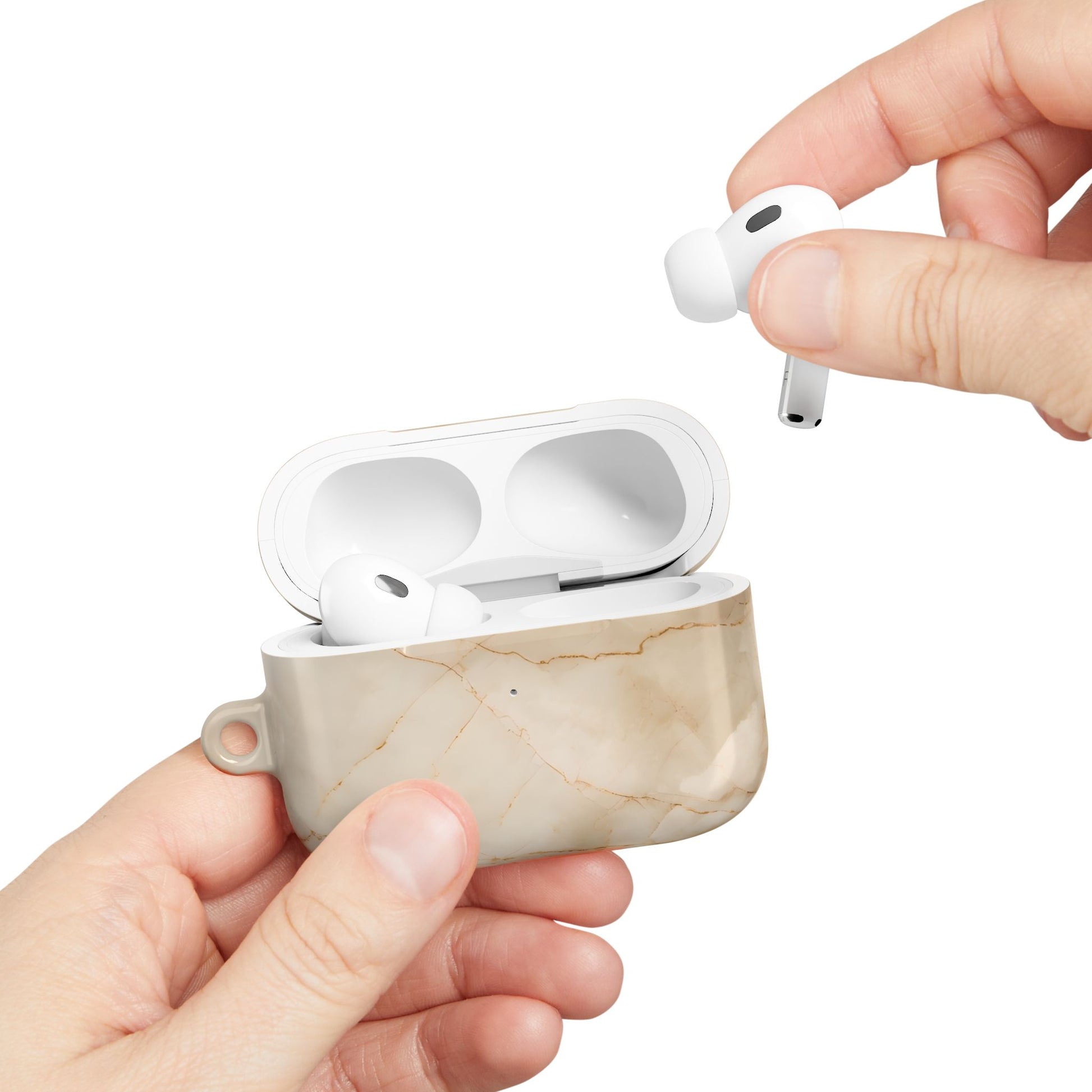 Hand placing AirPods into Parchment Mist AirPods case with soft marble vein design