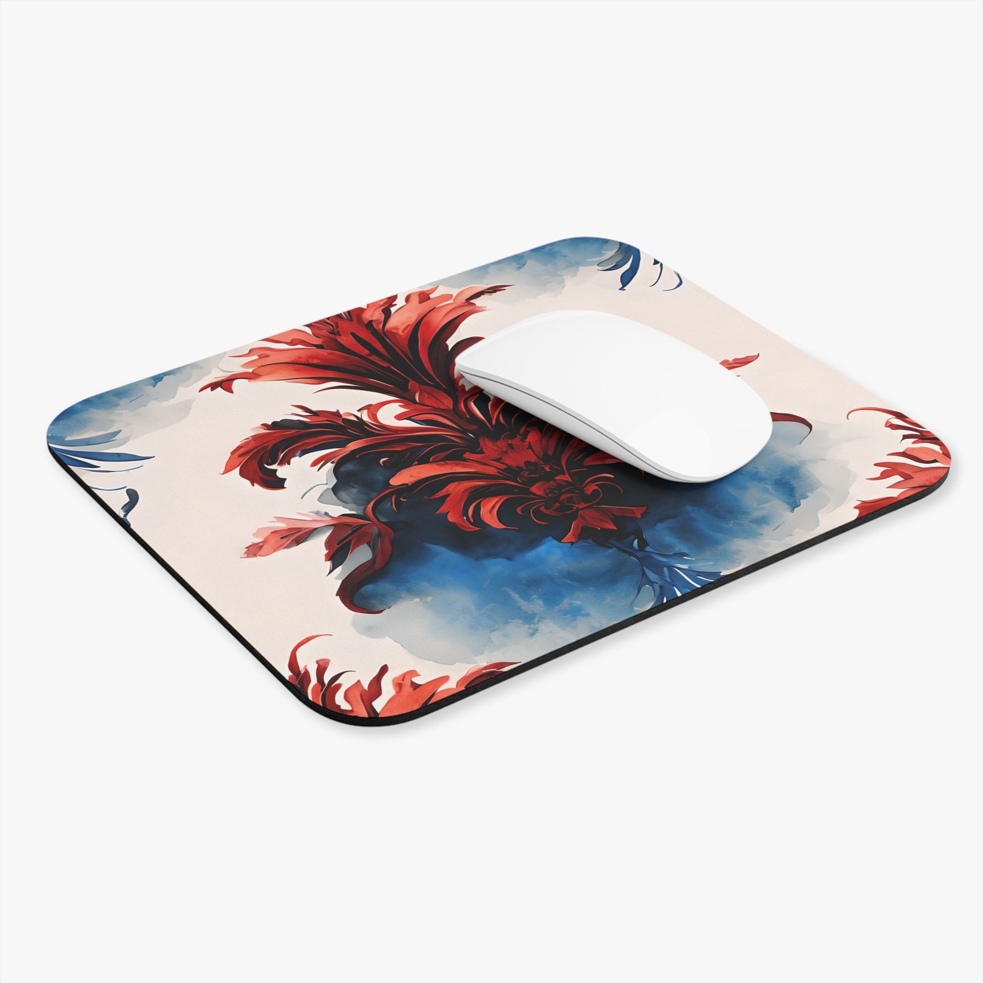 Crimson Plume mouse pad in workspace with mouse showing red abstract plume artwork