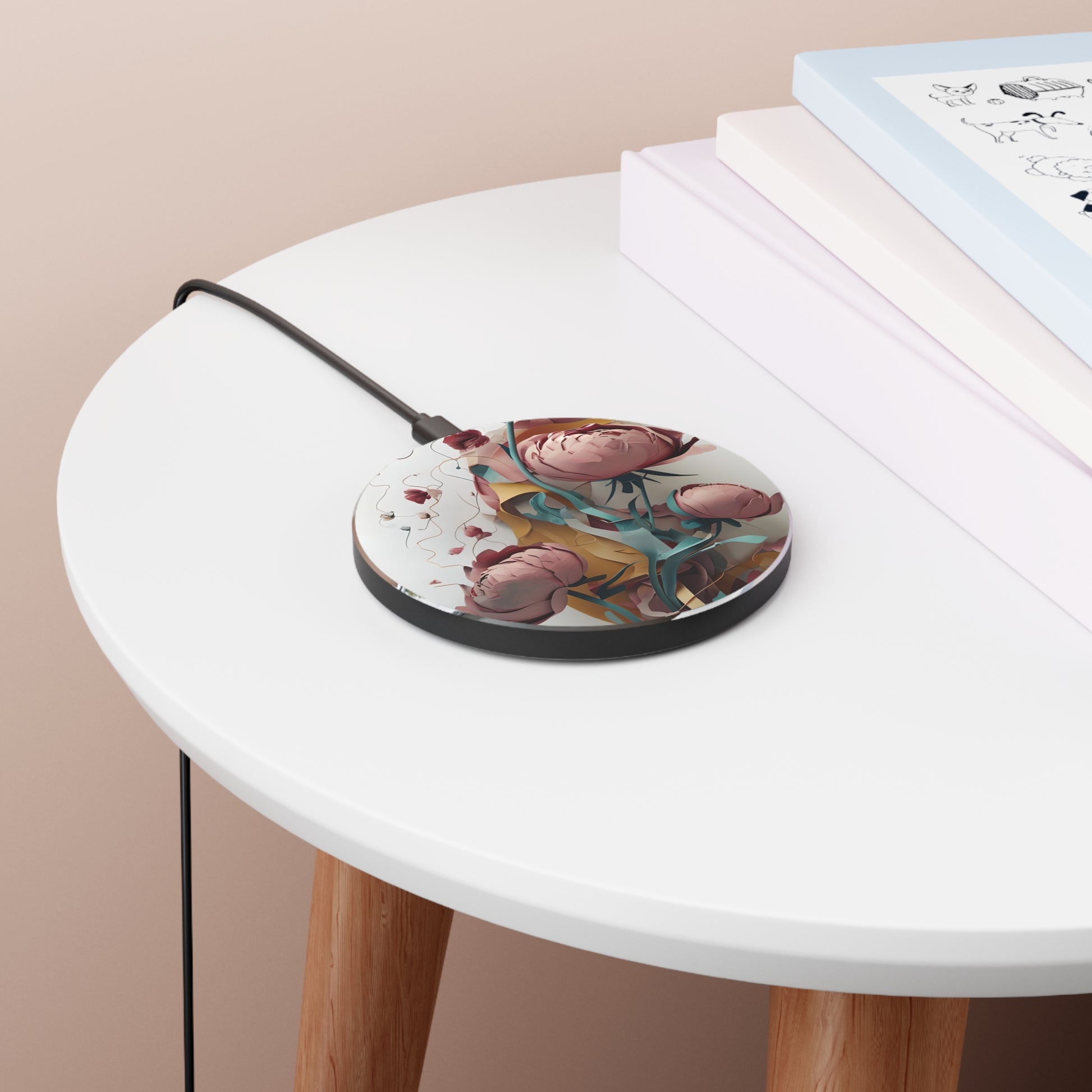 Blushing Peony Veil pink peony flower art Qi wireless charger on bedside table with books