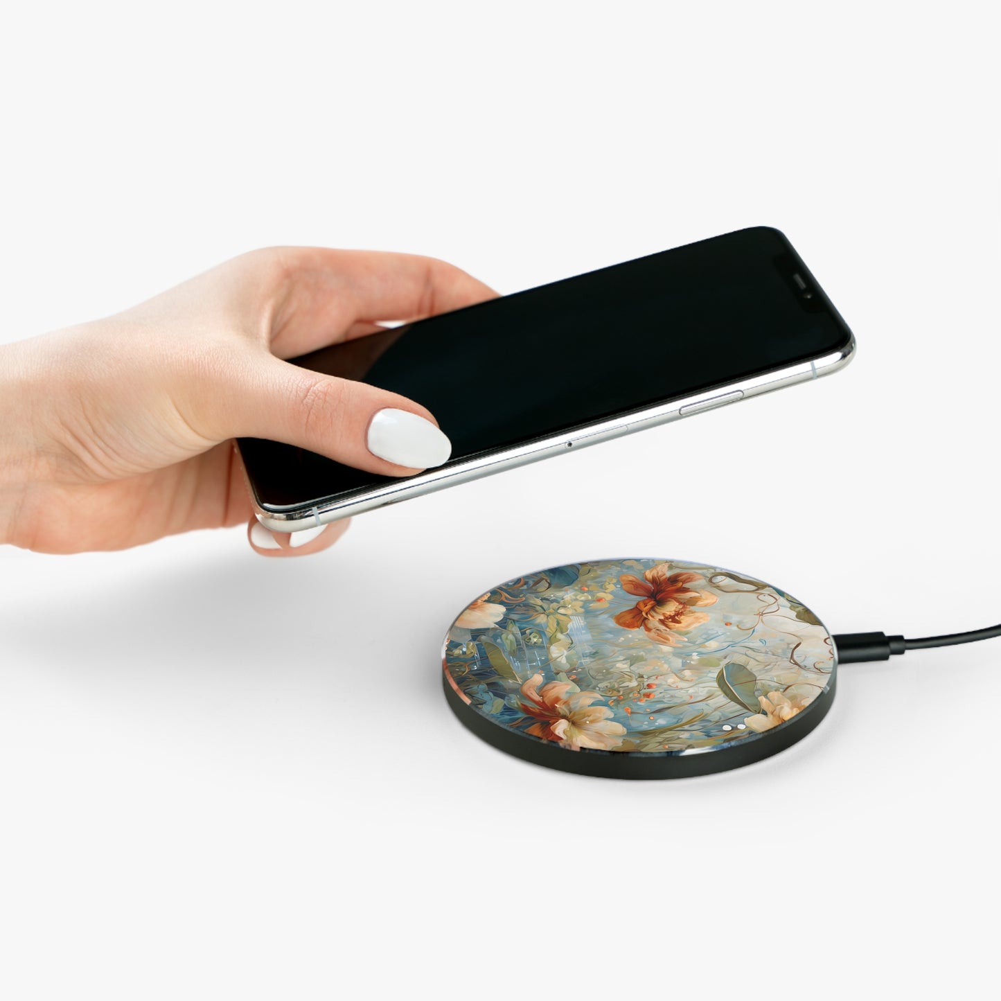 Hand placing smartphone on Waterlily Dreamscape water lily pond design Qi wireless charger