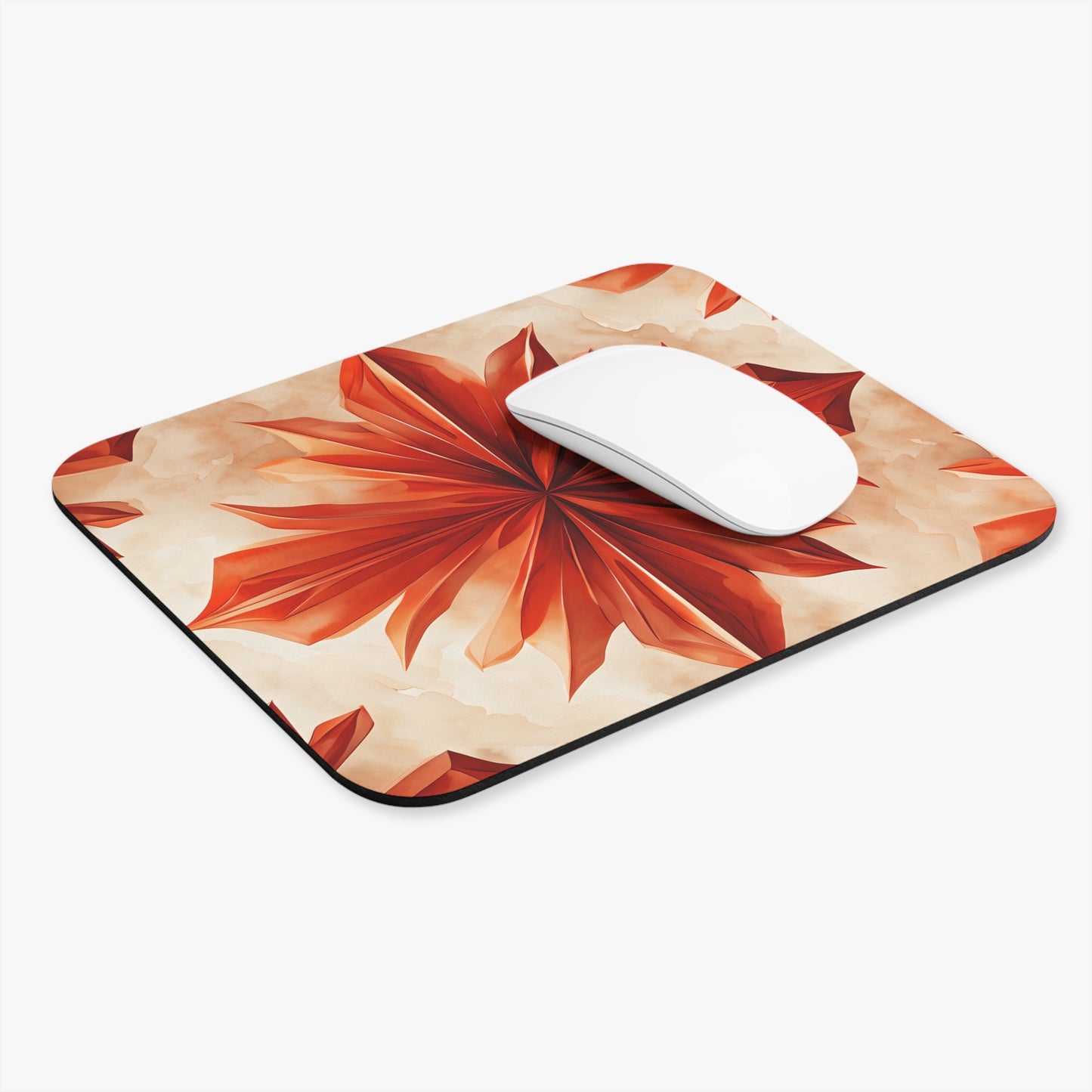 Sunset Fleur mouse pad in workspace with mouse showing vibrant orange flower artwork