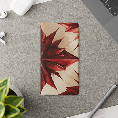 Ruby Compass Samsung Galaxy wallet flip phone case on a desk beside stationery featuring red geometric starburst design and folio card holder