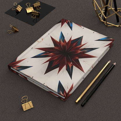Garnet Starburst red white and blue 
hardcover journal on desk with pencils and stationery
